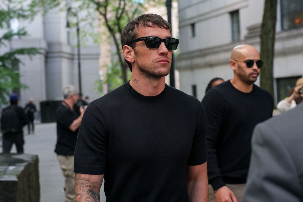 Alex Fine walks outside the courthouse in Manhattan on Monday.