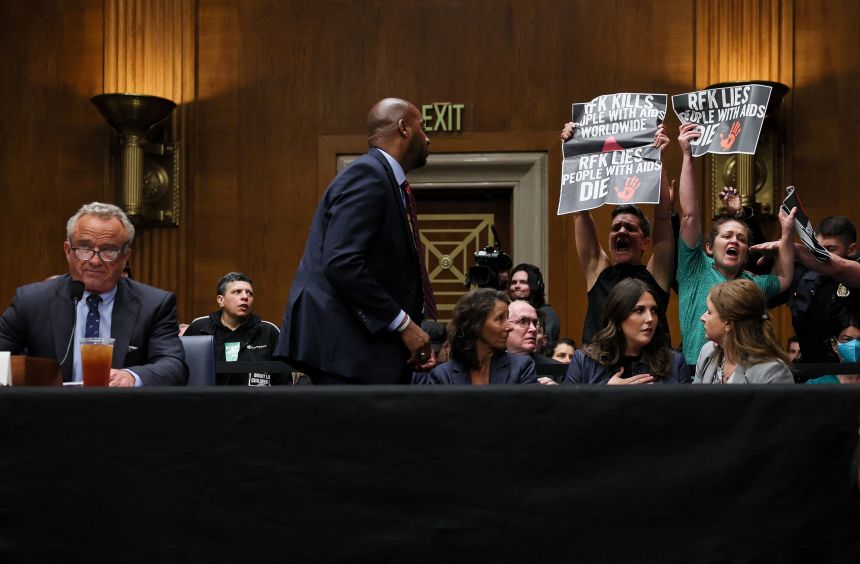 Protesters interrupted US Health and Human Services Secretary Robert F. Kennedy Jr.'s opening statement before the Senate HELP Committee on Wednesday.