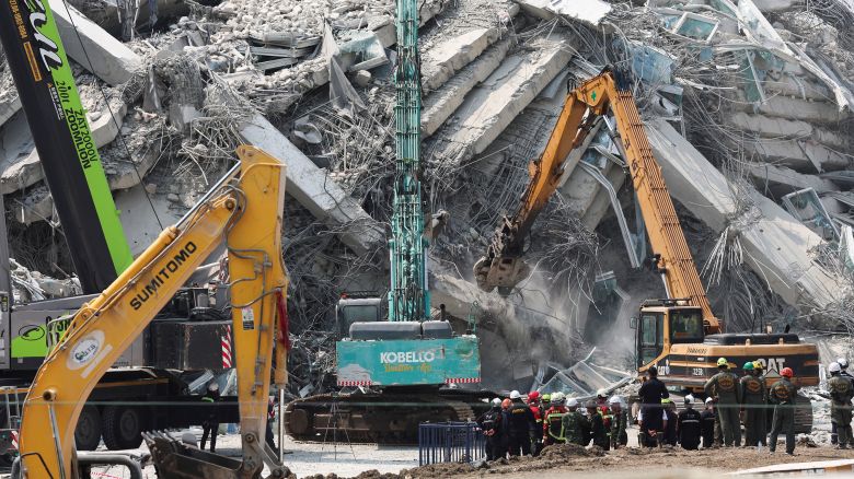 Rescue personnel workers at the site of a building that collapsed following a strong earthquake in Bangkok, Thailand on March 29, 2025.