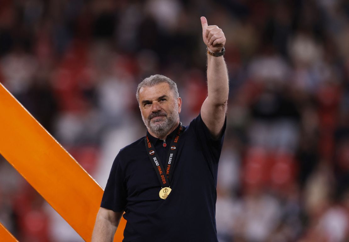 Hotspur manager Ange Postecoglou celebrates after winning the Europa League final.