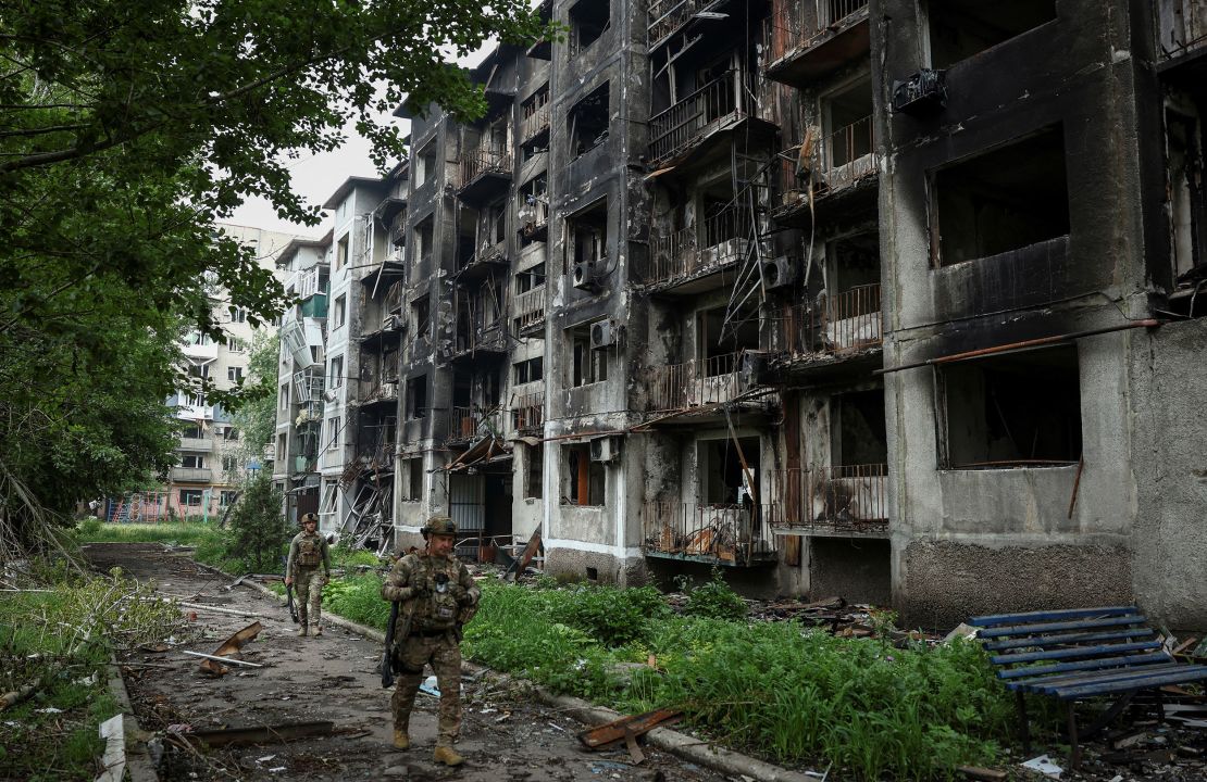 Ukrainian officers evacuate people from frontline towns and villages in Donetsk region, Ukraine on May 21.