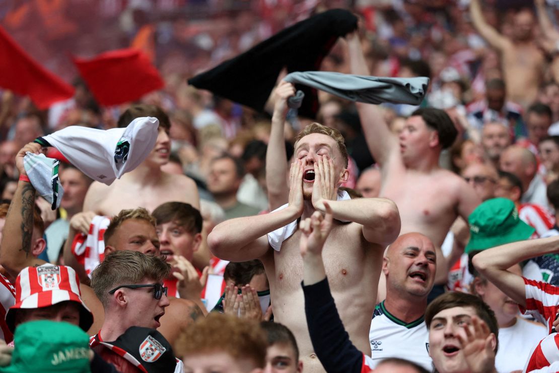 Sunderland fans celebrate their team's dramatic win.
