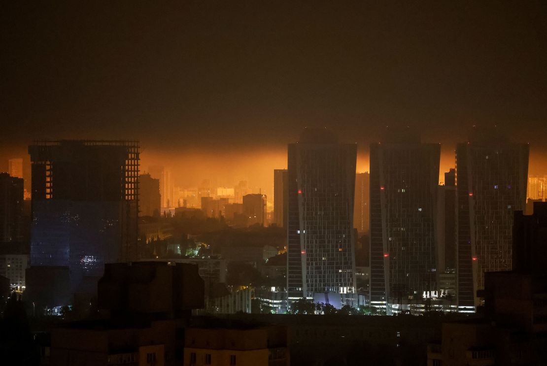 An explosion of a drone lights up the sky over Kyiv, on Sunday.