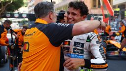 Lando Norris celebrates with McLaren chief executive Zak Brown after winning the Monaco Grand Prix.