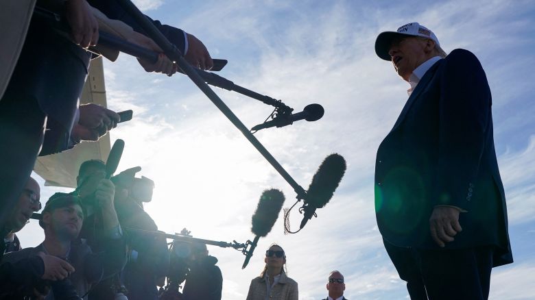 President Donald Trump speaks to the media before boarding Air Force One as he departs for Washington, DC, at Morristown Municipal Airport in Morristown, New Jersey, on May 25.