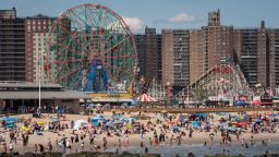 People enjoy the beach on Memorial Day at Coney Island in Brooklyn on May 26.