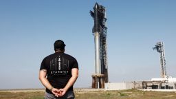 Matt Farrah of Newcastle, Australia views SpaceX's next-generation Starship spacecraft atop its Super Heavy booster is prepared for launch on its ninth test at the company's launch pad in Starbase, Texas, U.S., May 27, 2025. REUTERS/Joe Skipper