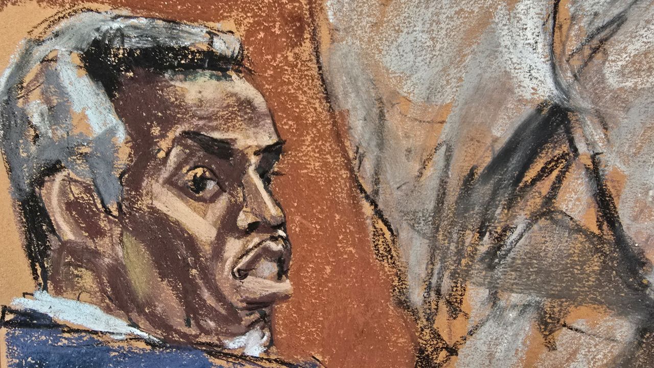 Sean "Diddy" Combs watches as his defense lawyer Brian Steel cross examines Los Angeles Police Department (LAPD) Officer Christopher Ignacio at Combs' sex trafficking trial in New York City, New York, U.S., May 28, 2025 in this courtroom sketch.