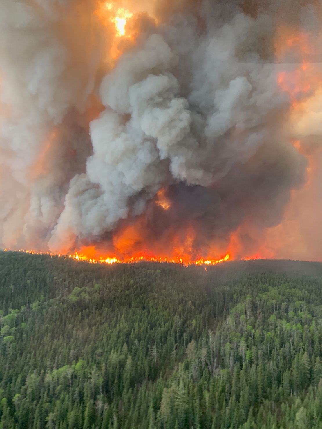Smoke rises from the WE017 wildfire in Sherridan, Manitoba, Canada on May 27.