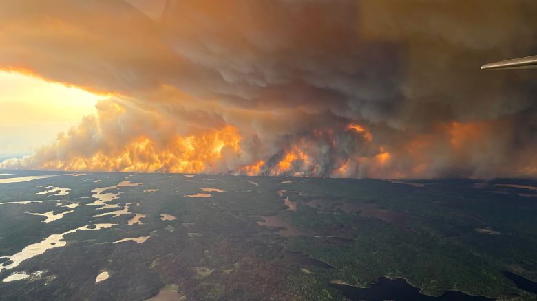 Smoke rises from wildfire WE024 which has prompted a pre-evacuation notice in Flin Flon, Manitoba, Canada May 27, 2025.