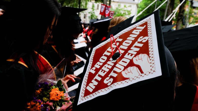 A graduating student wears their hat, decorated with a statement of support for international students, during the 374th Commencement exercises at Harvard University in Cambridge, Massachusetts, U.S., May 29, 2025. REUTERS/Brian Snyder