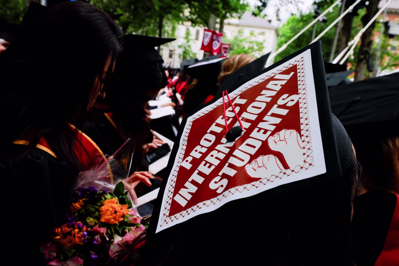 A graduating student wears their decorated hat during the commencement ceremony at Harvard University on Thursday.