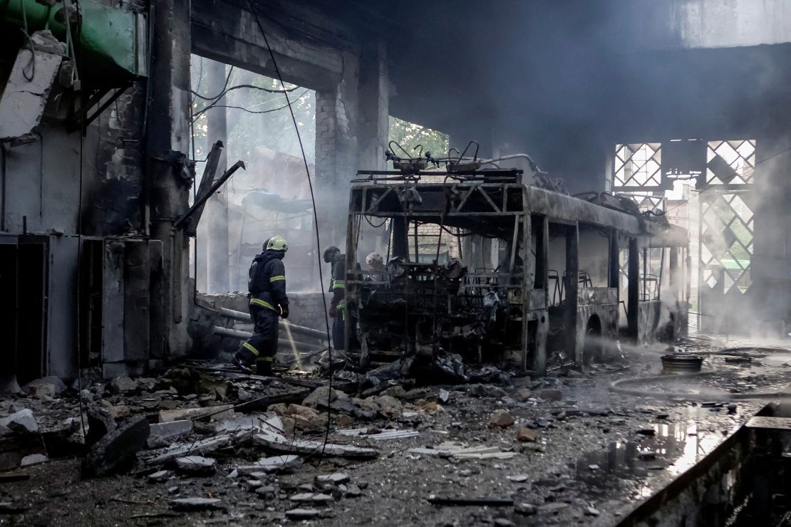 Rescuers work at a site of a trolleybus depot, hit by Russian drone strike in Kharkiv, Ukraine on May 30, 2025.