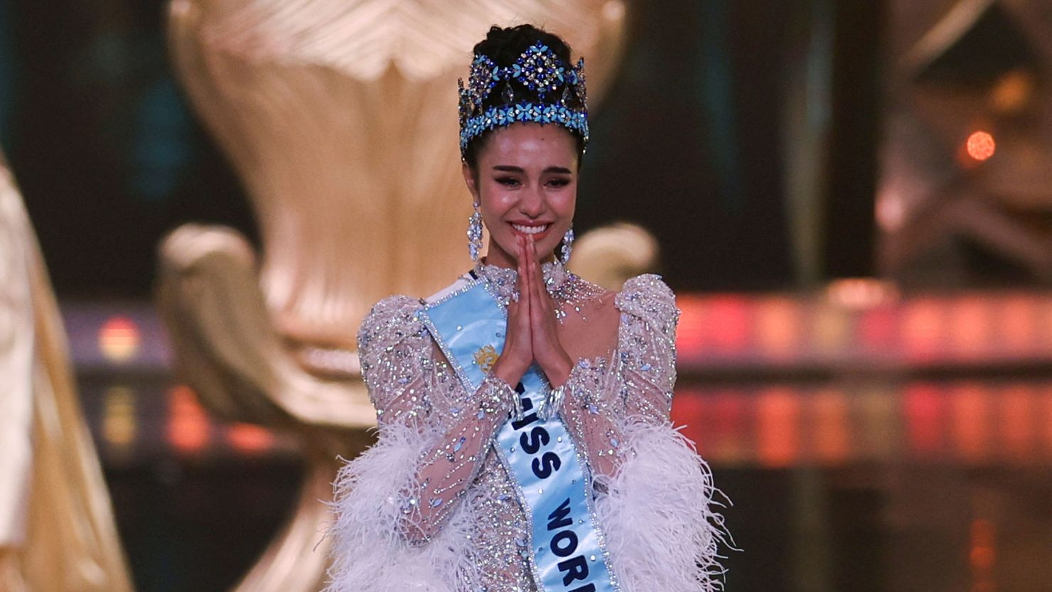 Thailand's Opal Suchata Chuangsri reacts after being crowned Miss World in Hyderabad, India, on Saturday.