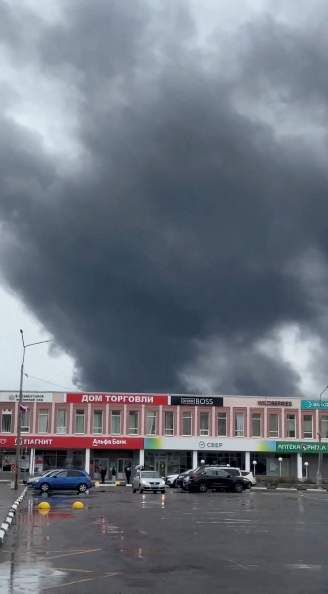 Smoke rises following what local authorities called a Ukrainian drone attack, in the course of Russia-Ukraine conflict, in Olenegorsk of the Murmansk region, Russia, in this still image from social media video released on June 1, 2025.