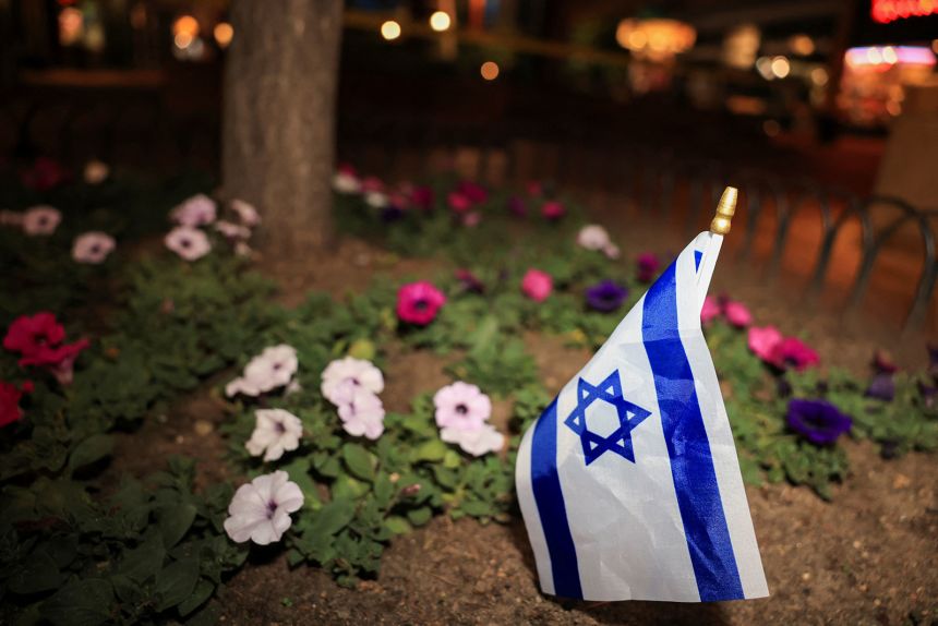 An Israeli flag is placed at the Pearl Street Mall, after an attack that injured multiple people in Boulder, Colorado, U.S. June 1, 2025.  REUTERS/Kevin Mohatt