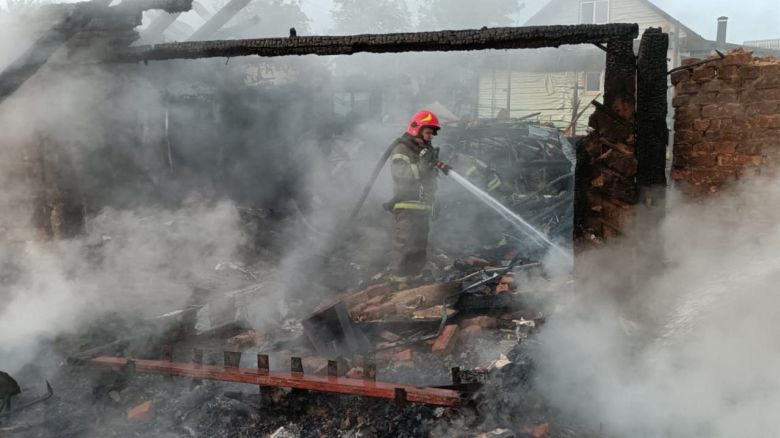 A firefighter attends a site of a drone attack in Pryluky, Ukraine, on Thursday.