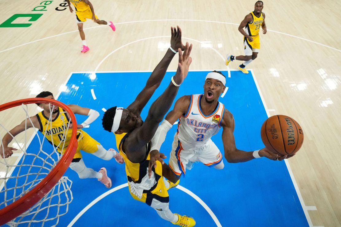 Oklahoma City Thunder guard Shai Gilgeous-Alexander shoots the ball against Indiana Pacers forward Pascal Siakam during the second quarter.