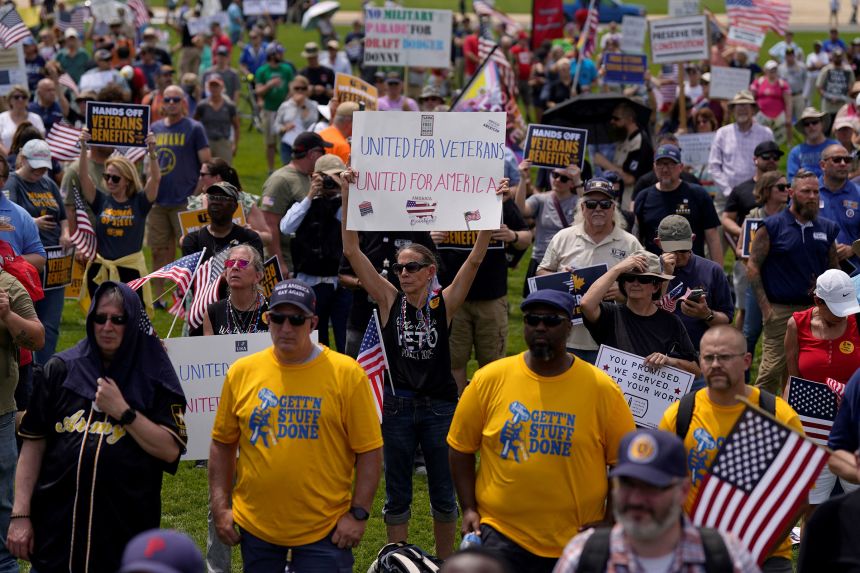 Veterans, family members and activists demonstrate during a protest against the Trump administration's cuts to the Department of Veterans Affairs, in Washington, DC, on June 6, 2025.