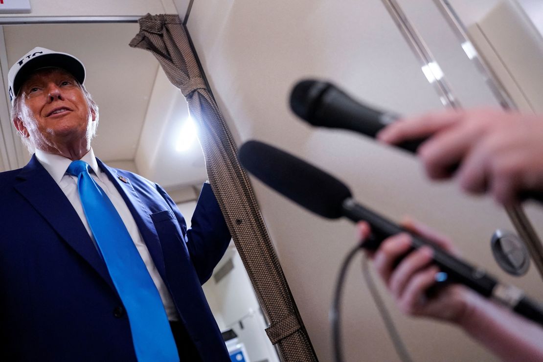President Donald Trump speaks to reporters aboard Air Force One en route to New Jersey, on June 6, 2025.