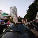 Demonstrators wave Mexican flags during a protest against federal immigration sweeps, in downtown Los Angeles, California, U.S. June 9, 2025. REUTERS/Aude Guerrucci REFILE - CORRECTING FROM "FEDERAL IMMIGRATION" TO "FEDERAL IMMIGRATION SWEEPS".