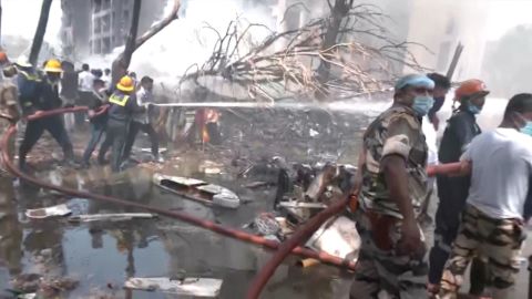 Emergency personnel work at the crash site of an Air India plane in Ahmedabad, India, June 12, 2025, in this still image taken from video. ANI/Reuters TV via REUTERS    THIS IMAGE HAS BEEN SUPPLIED BY A THIRD PARTY. INDIA OUT. NO COMMERCIAL OR EDITORIAL SALES IN INDIA. 