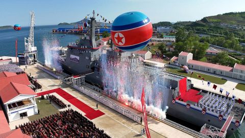Confetti is released during the launching ceremony of the repaired warship in Rajin, North Korea, on June 12, 2025