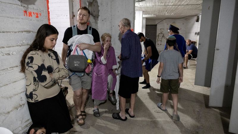 ‘The situation is far from funny, but you have to keep your sanity’: Israeli families endure uncertain nights in cramped bomb shelters