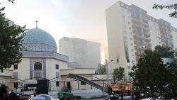 Smoke rises as a building stands damaged in the aftermath of Israeli strikes, in Tehran, Iran, June 13, 2025.