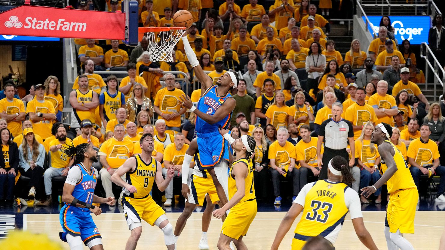 Oklahoma City Thunder guard Shai Gilgeous-Alexander shoots the ball against the Indiana Pacers during Game 4 of the 2025 NBA Finals.
