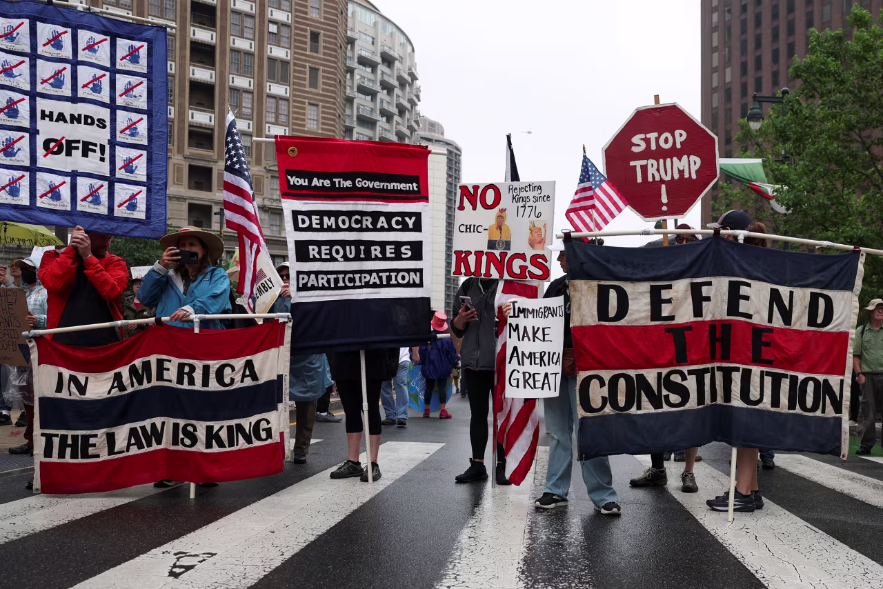 People attend a No Kings Day protest against US President Donald Trump's policies, in Philadelphia, on June 14.