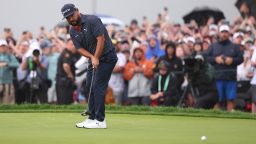 Jun 15, 2025; Oakmont, Pennsylvania, USA; JJ Spaun putts on the 18th green to win during the final round of the U.S. Open golf tournament. Mandatory Credit: Bill Streicher-Imagn Images