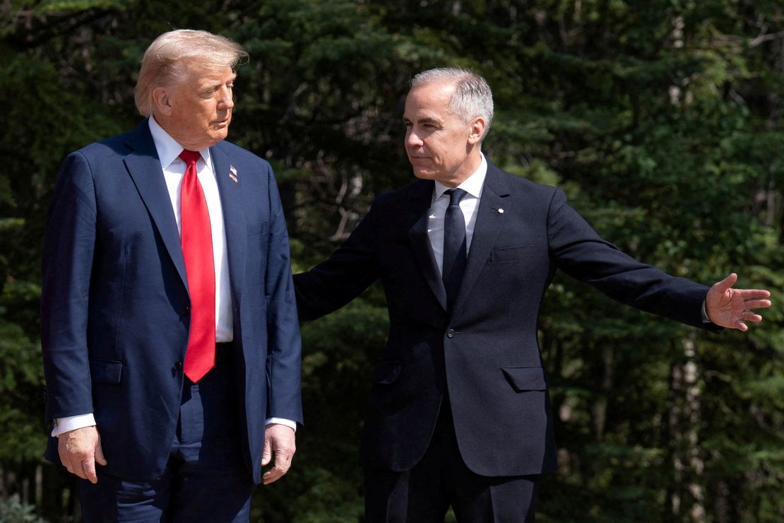President Donald Trump is greeted by Prime Minister of Canada Mark Carney.