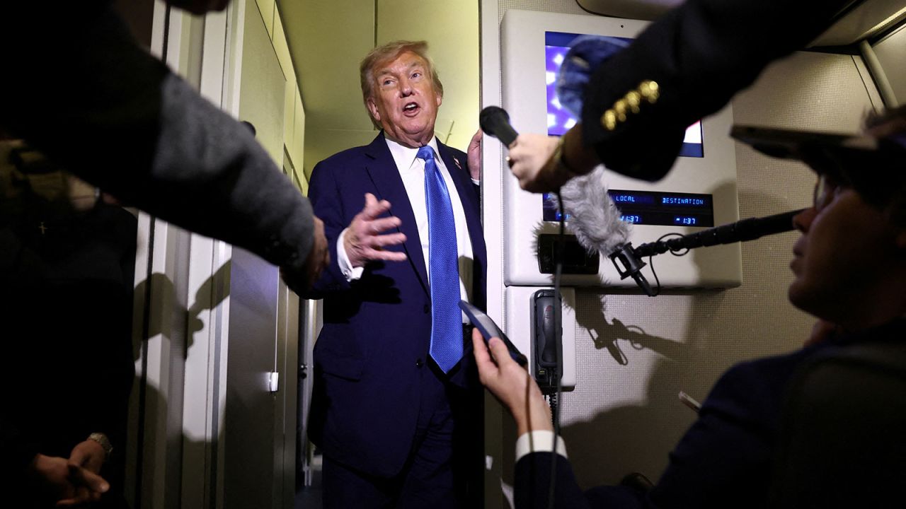 President Donald Trump speaks to reporters aboard Air Force One after departing early from the the G7 summit in Canada to return to Washington, on Tuesday, June 17.