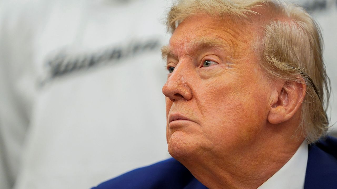 President Donald Trump looks on during a meeting with players of the Juventus soccer team, where he also answered questions from the media,  in the Oval Office of the White House in Washington, D.C., on Wednesday.