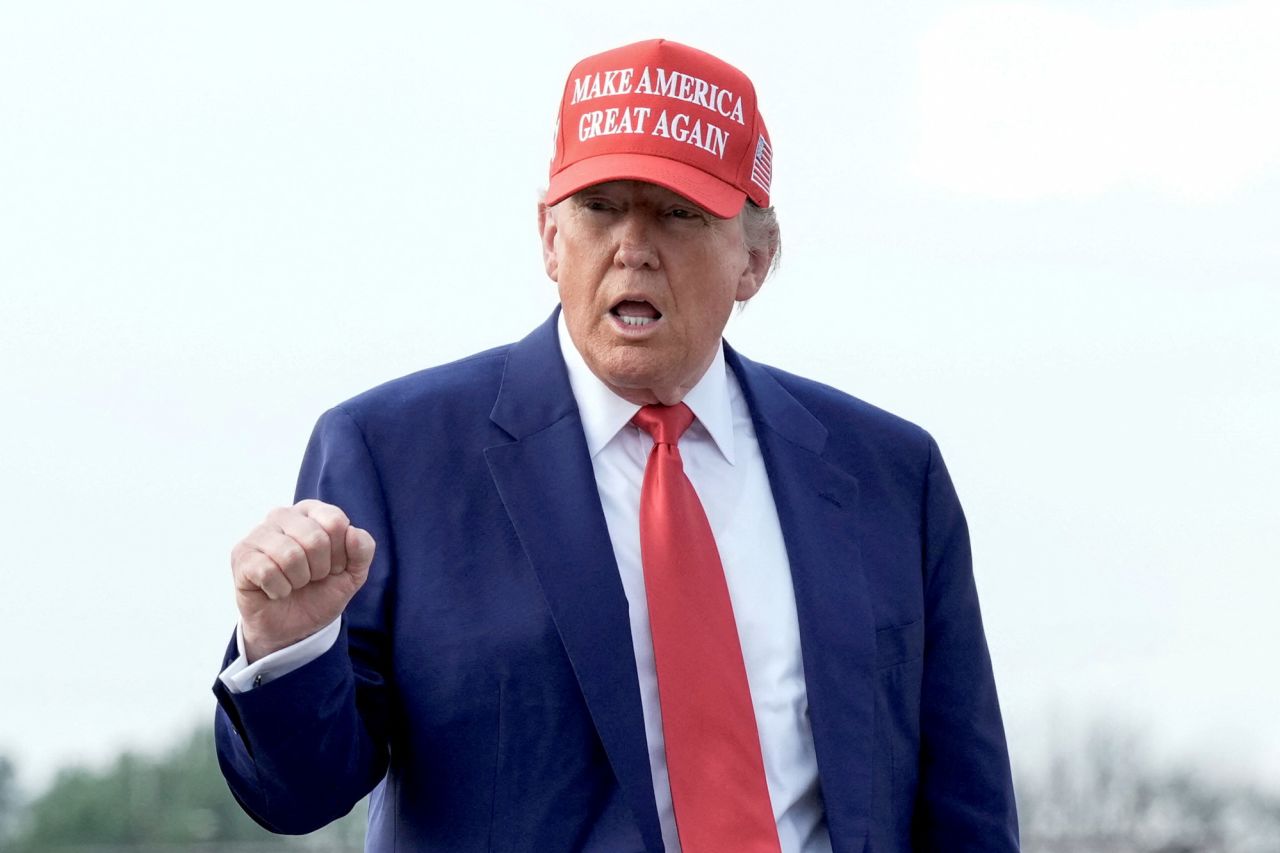 U.S. President Donald Trump gestures at Morristown Municipal Airport in Morristown, New Jersey, on Saturday.