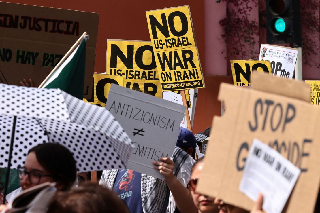 People attend an anti-war demonstration in Los Angeles on Saturday.
