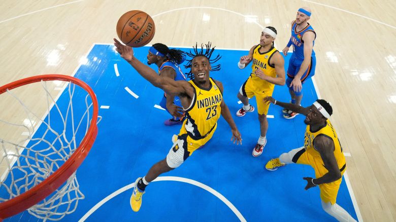 Jun 22, 2025; Oklahoma City, Oklahoma, USA; Indiana Pacers forward Aaron Nesmith (23) reaches for the ball against the Oklahoma City Thunder during the first half of game seven of the 2025 NBA Finals at Paycom Center. Mandatory Credit: Kyle Terada-Imagn Images