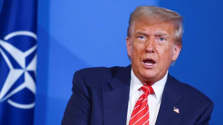 U.S. President Donald Trump speaks next to NATO Secretary General Mark Rutte (not pictured), at the NATO leaders summit in The Hague, Netherlands June 25, 2025. REUTERS/Piroschka Van De Wouw/Pool