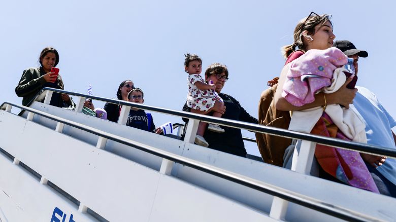 Jewish immigrants from Europe who want to build a new life in Israel despite ongoing regional violence, disembark from an airplane upon their arrival at Ben Gurion International Airport, near Lod, Israel June 25, 2025. REUTERS/Tomer Neuberg