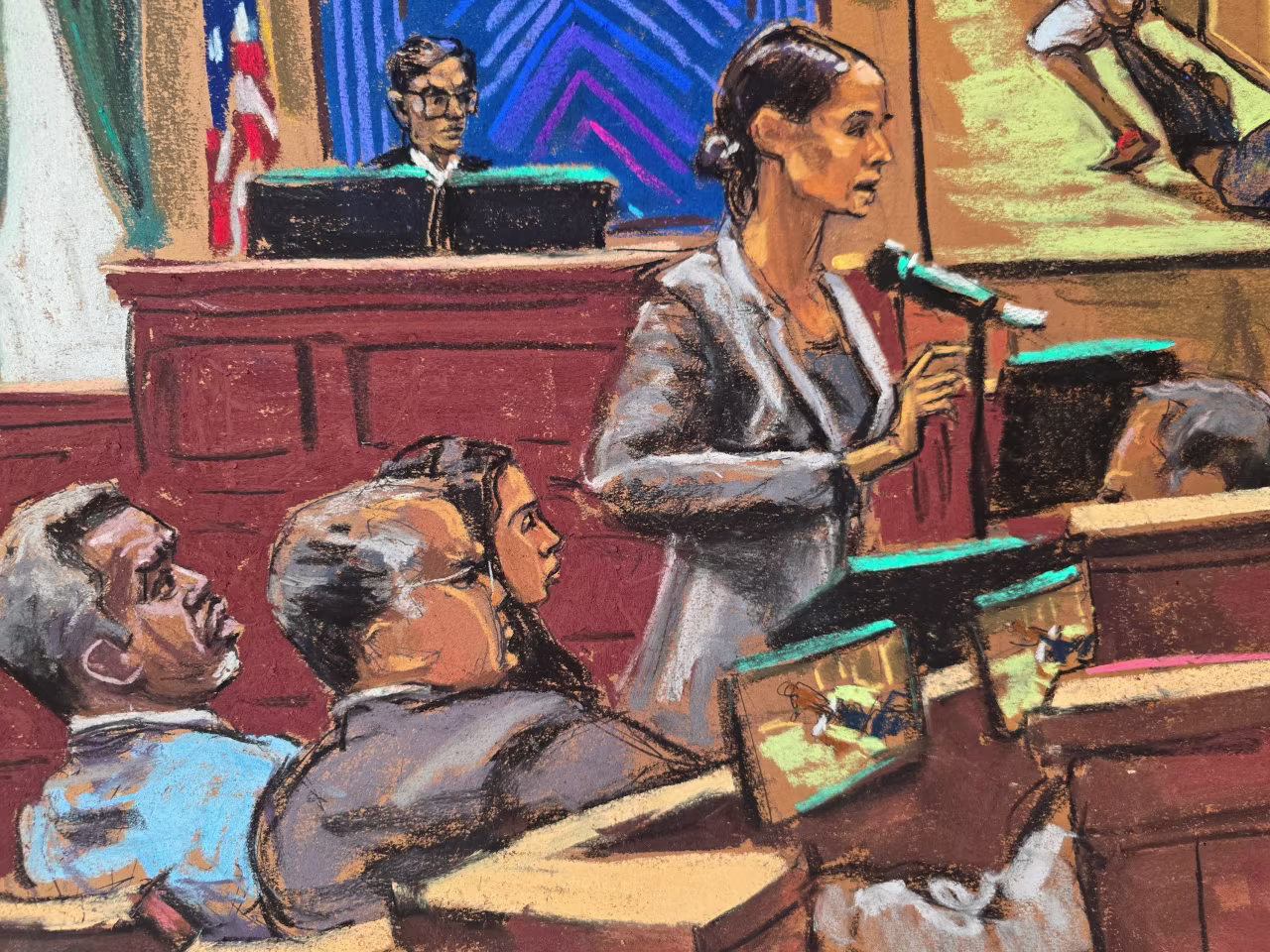 Sean "Diddy" Combs listens alongside his lawyers Marc Agnifilo and Teny Geragos as Assistant U.S. Attorney Christy Slavik makes her closing arguments on Thursday.