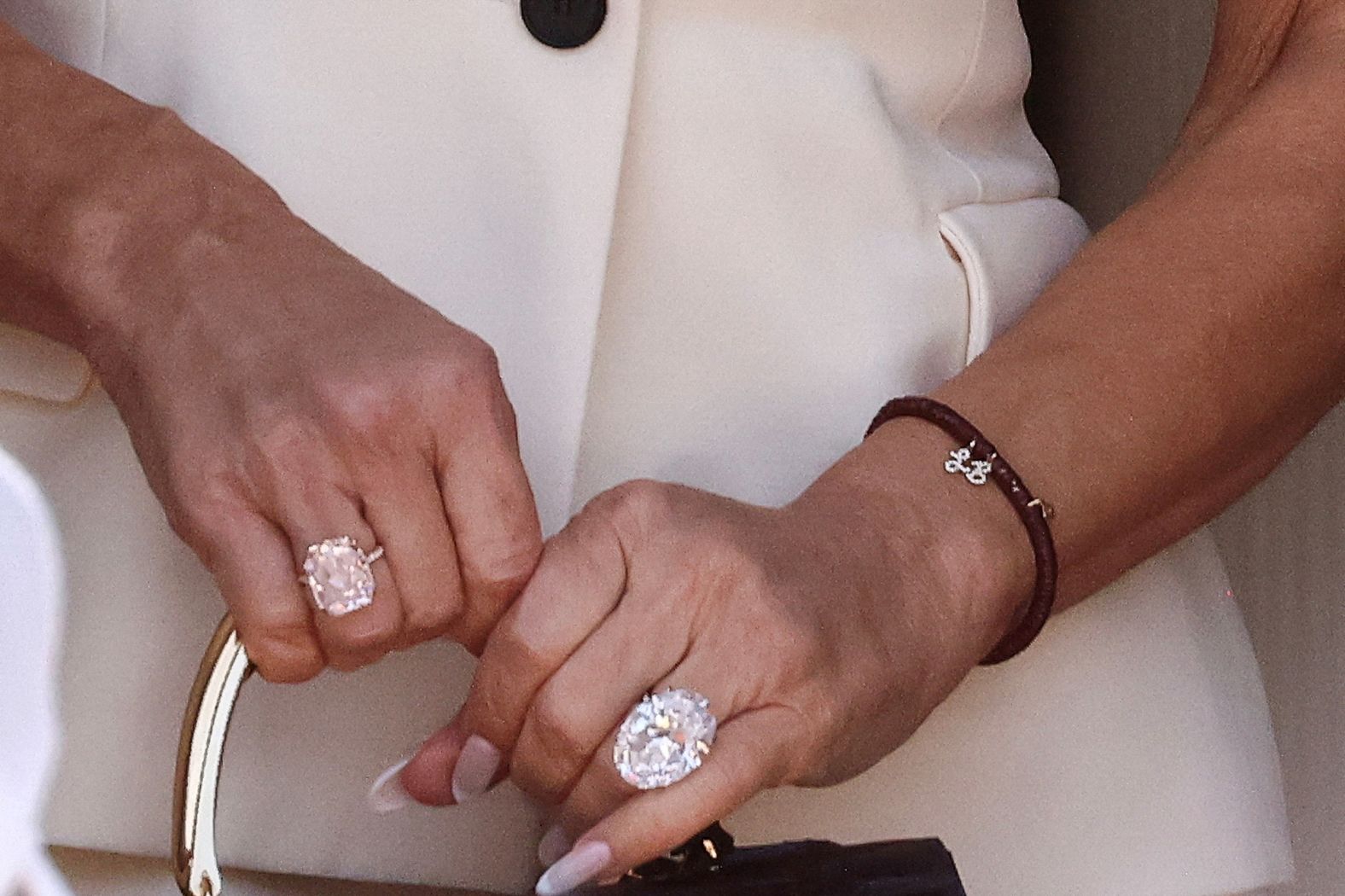 Sanchez's jewelry is seen as she holds her Hermès Kelly bag on Friday.