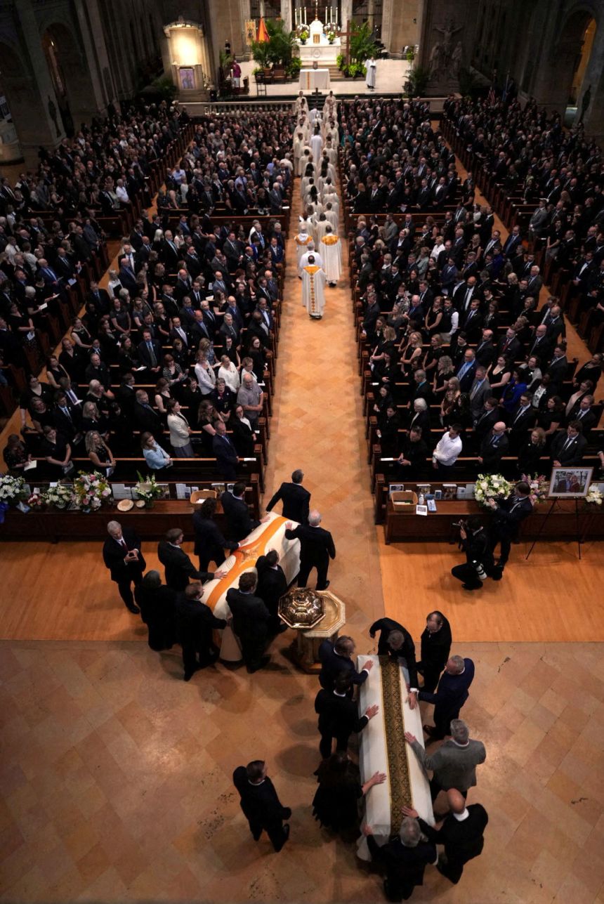 The caskets of Minnesota state Rep. Melissa Hortman and her husband Mark Hortman are processed down the aisle at the Basilica of St. Mary in Minneapolis, Minnesota, on June 28.