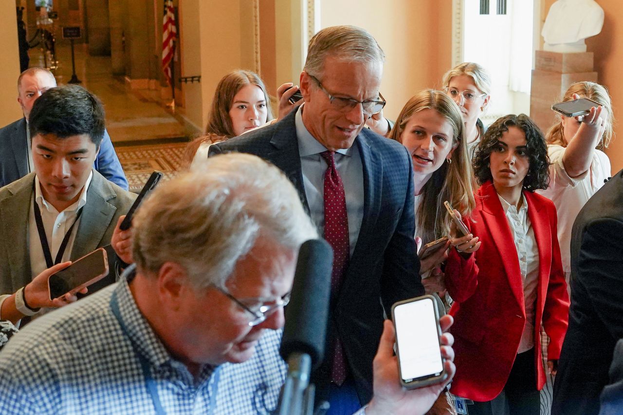 Senate Majority Leader John Thune speaks to reporters on Capitol Hill on Saturday.