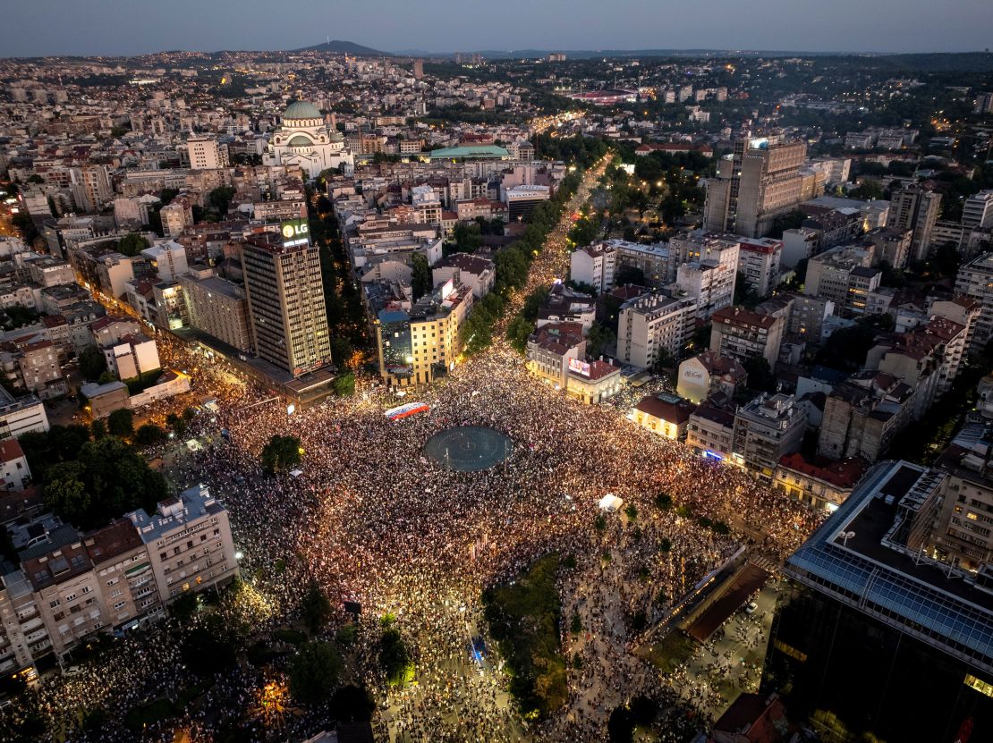 A drone view shows Serbian students and other demonstrators lighting mobile phones flash lights during an anti-government protest demanding snap elections at the Slavija square, in Belgrade, Serbia, June 28, 2025.