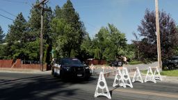 Kootenai County Sheriff’s deputies block a road leading to an area where multiple firefighters were attacked when responding to a fire in the Canfield Mountain area outside Coeur d’Alene, Idaho, U.S. June 29, 2025.  REUTERS/Young Kwak