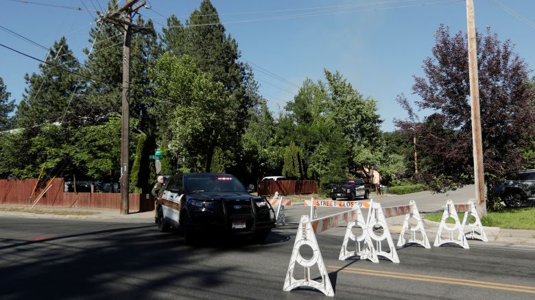 Kootenai County Sheriff’s deputies block a road leading to an area where multiple firefighters were attacked when responding to a fire in the Canfield Mountain area outside Coeur d’Alene, Idaho, U.S. June 29, 2025.  REUTERS/Young Kwak