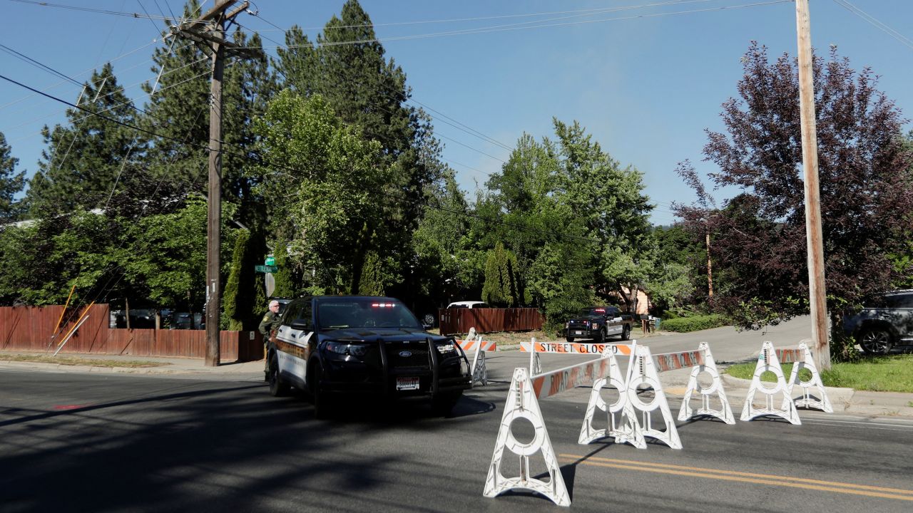 Kootenai County Sheriff’s deputies block a road leading to an area where multiple firefighters were attacked when responding to a fire in the Canfield Mountain area outside Coeur d’Alene, Idaho, U.S. June 29, 2025.  REUTERS/Young Kwak