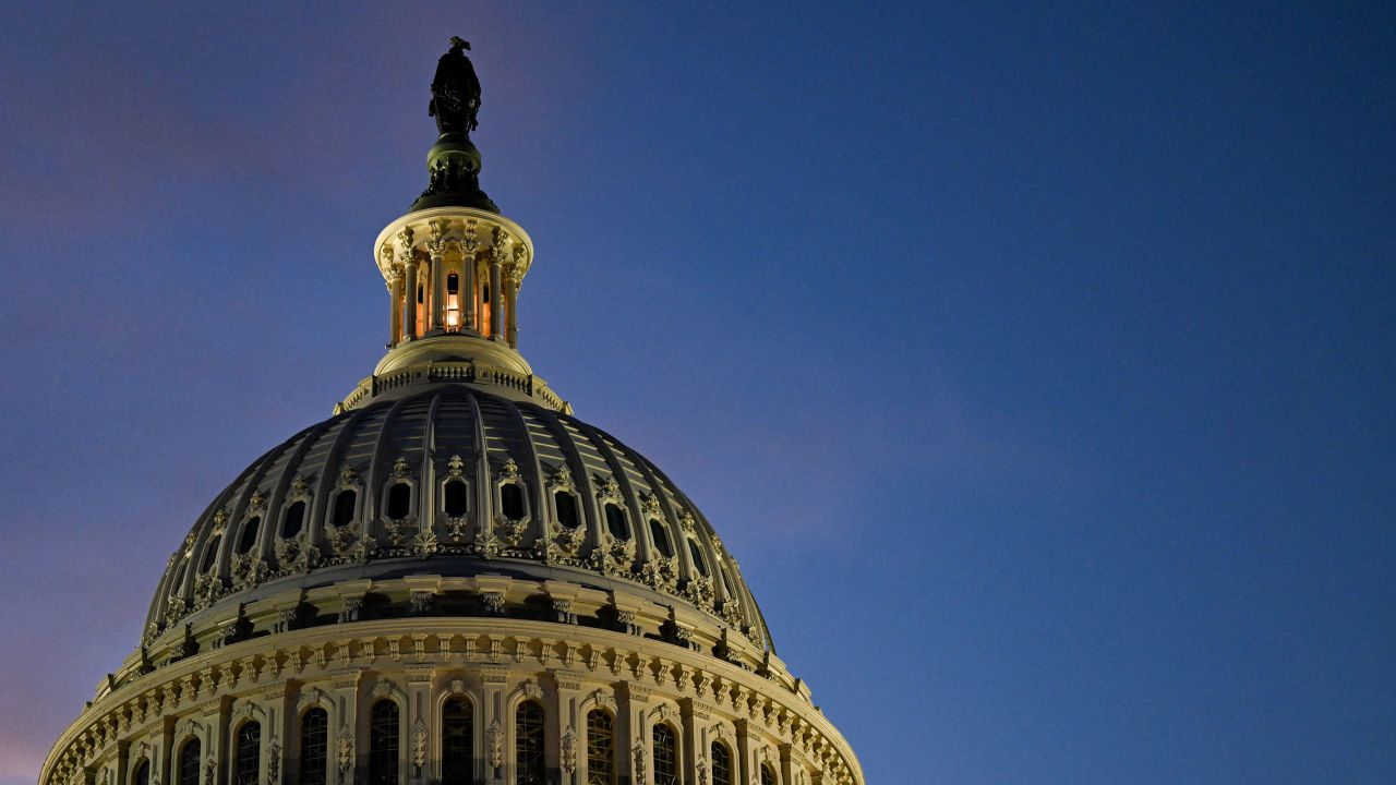 A U.S. flag flutters near the U.S. Capitol building, in Washington, D.C., U.S., July 3, 2025. REUTERS/Annabelle Gordon