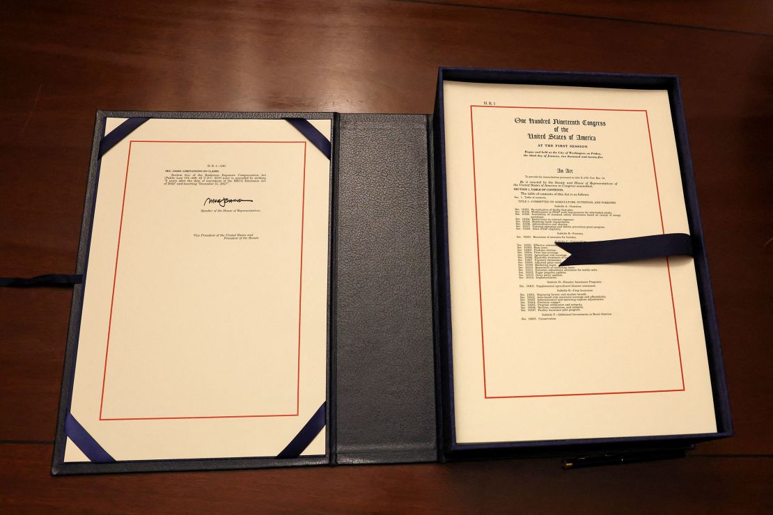 President Donald Trump's bill is seen after being signed by House Speaker Mike Johnson.